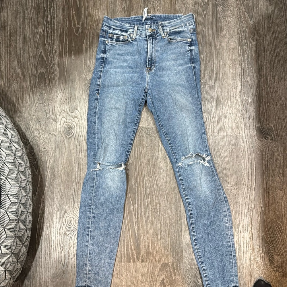 Good American Good Legs skinny jeans with rips in both knees